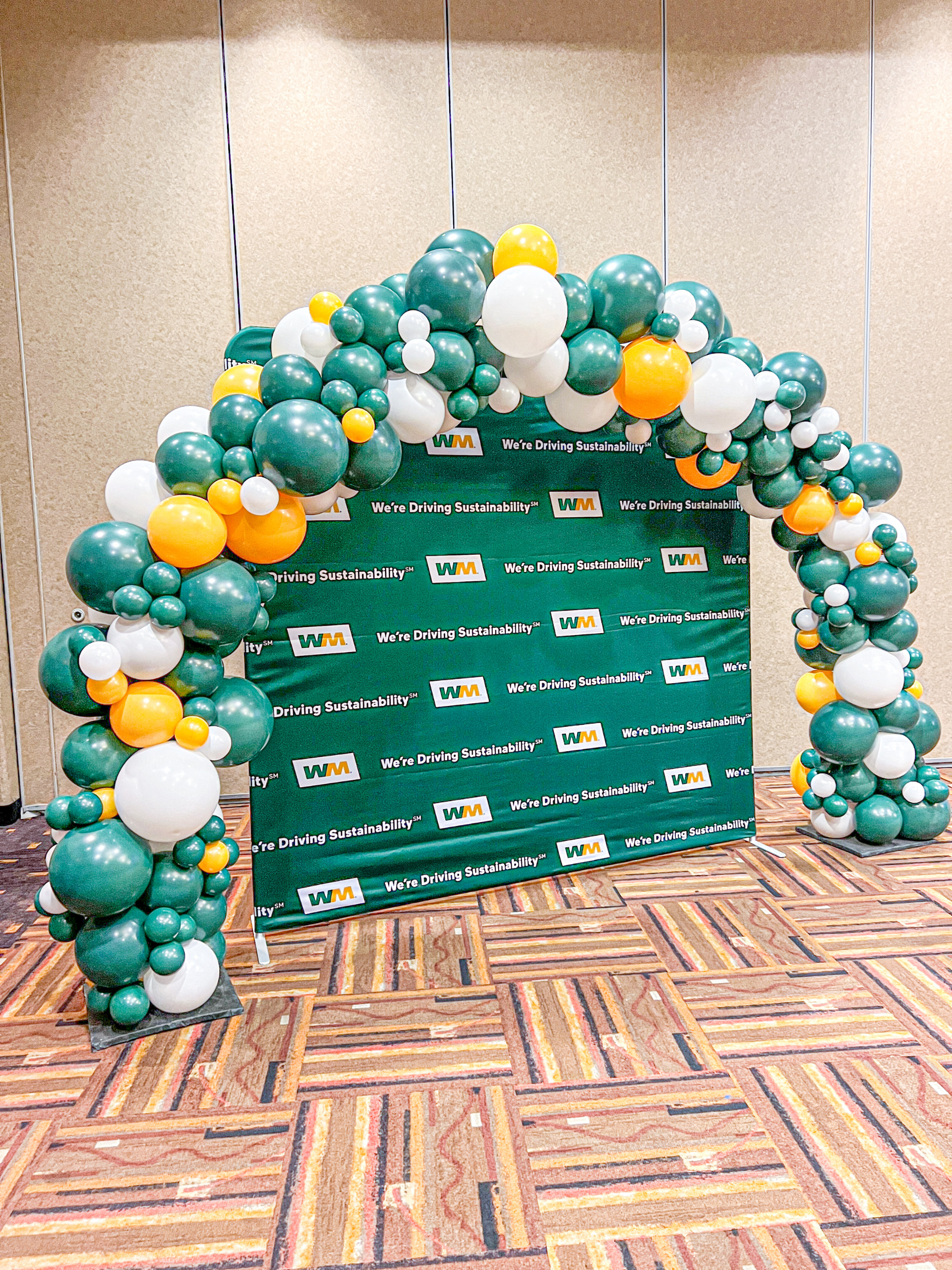 Standard Arch using Evergreen, Goldenrod, and white balloons