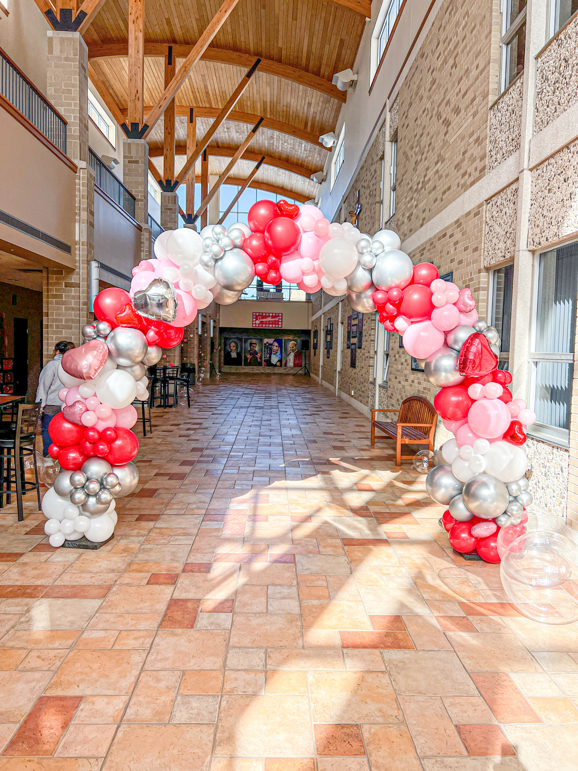 Valentines Day Balloon Arch with red, pink, white & Silver Balloons